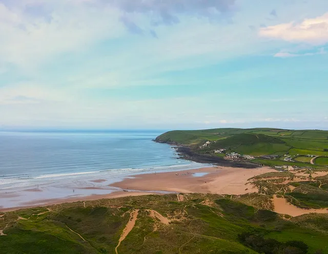 Getting to know Braunton&nbsp;Braunton is one of North Devon’s most vibrant and well‑loved villages, offering an appealing blend of natural beauty, rich heritage and thriving local life. Often described as one of the largest villages in England, it sits just a few miles west of Barnstaple and serves as the gateway to some of the region’s finest beaches, including Saunton Sands and Croyde Bay. These long, golden beaches and rolling Atlantic waves make the area especially popular with surfers and families alike.&nbsp;Nature lovers are spoilt for choice. Braunton Burrows, a UNESCO Biosphere Reserve and one of the UK’s largest sand dune systems, lies just on the doorstep and provides a haven for wildlife, rare plant species and walkers seeking wide open landscapes. The Tarka Trail also passes through the village, offering miles of traffic‑free cycling and scenic walking routes through countryside and along the estuary.&nbsp;The village itself is full of character, with a welcoming high street, independent shops, cafés and restaurants. Its long history is woven into landmarks such as St Brannock’s Church and the medieval Great Field, one of the few surviving strip‑farming landscapes in the country. Together, these features give Braunton a distinctive sense of place where heritage and modern village life sit comfortably side by side.With beautiful scenery, excellent outdoor pursuits and a strong community feel, Braunton remains a highly desirable place to live, visit and explore. - Webbers